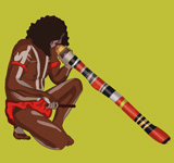 A man playing a didgeridoo